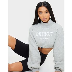 BRAND NEW PrettyLittleThing- Detroit, Michigan crop top sweater in grey